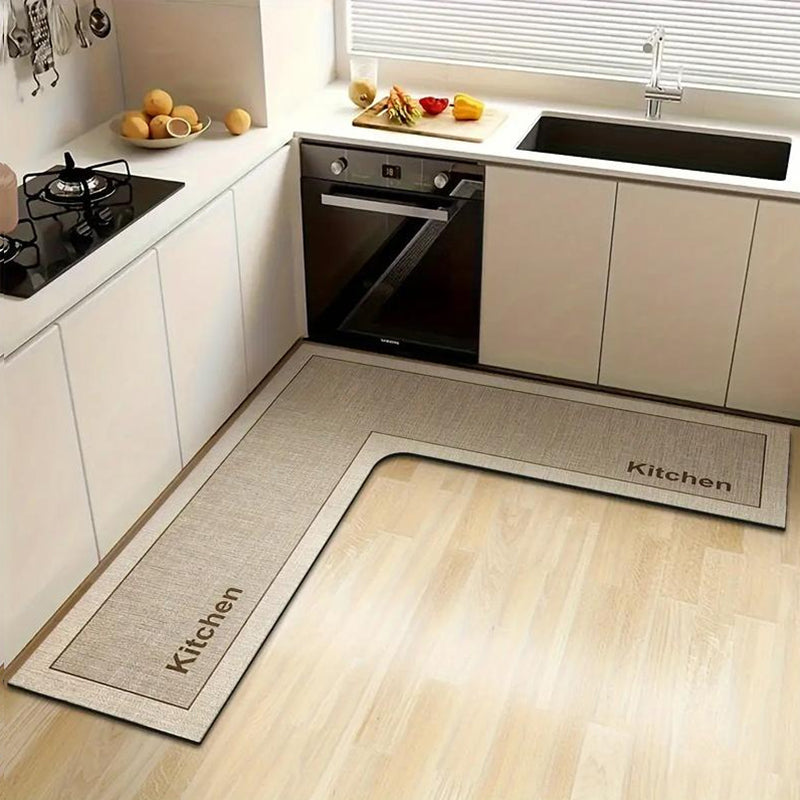 š§ Stop slipping on wet kitchen floors ā this L-shaped mat absorbs water and oil fast, stays put, and cushions your feet while you cook. š